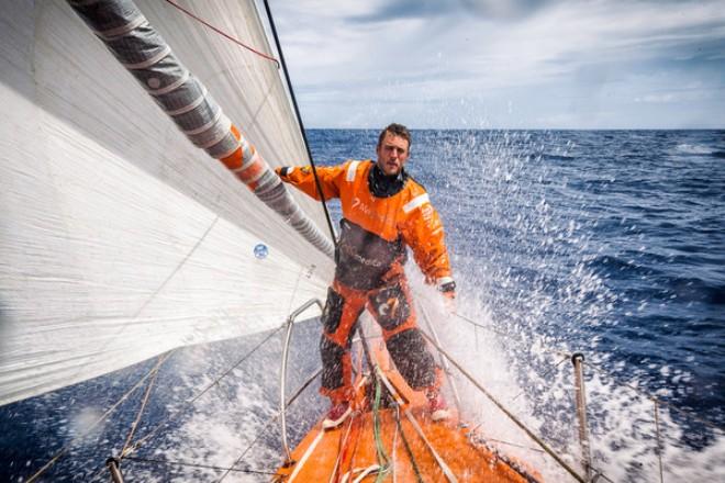 Team Alvimedica - Out of the doldrums,the pace quickens for the fleet on the race south to a light-wind trough of low pressure and the Vanuatu wind shadow. Nick Dana on the bow during a sail change - Volvo Ocean Race 2014-15 ©  Amory Ross / Team Alvimedica